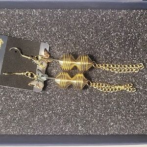 Gold dangle earrings with butterflies.